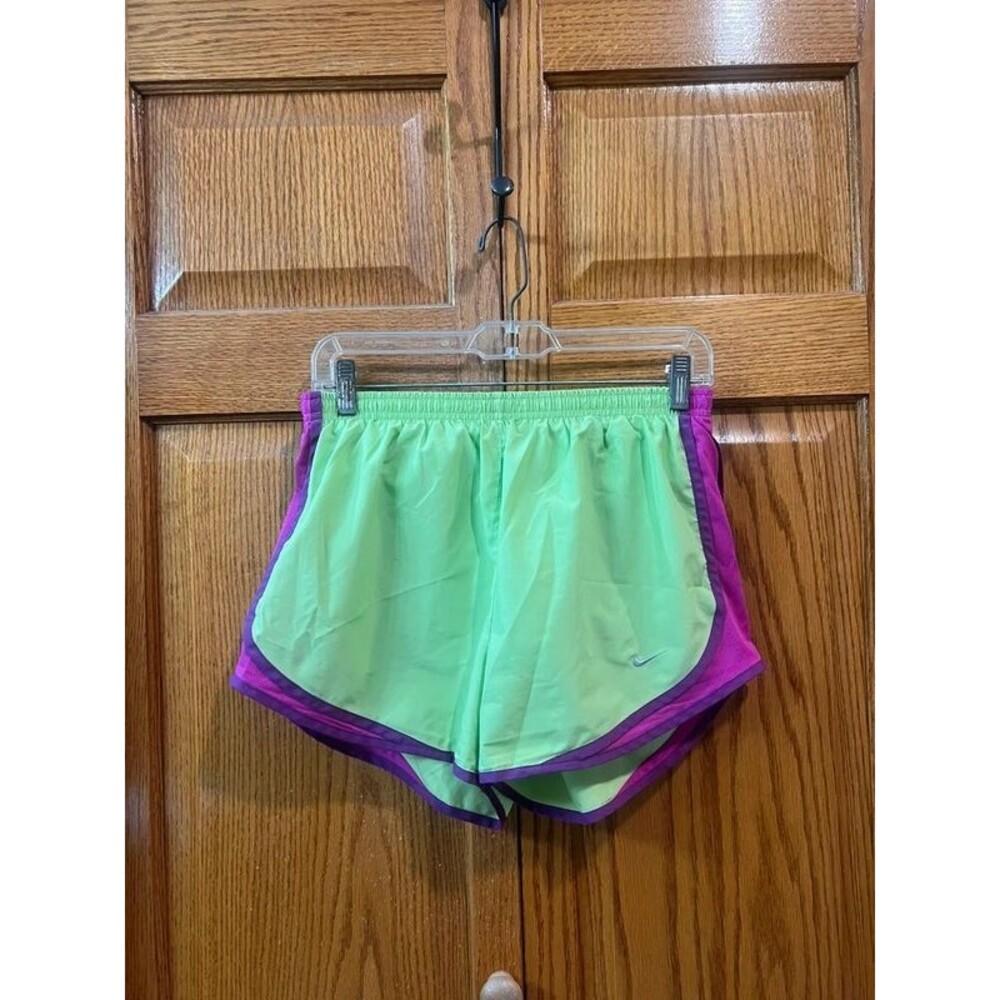 neon green and purple Nike Dri-FIT running shorts women’s M